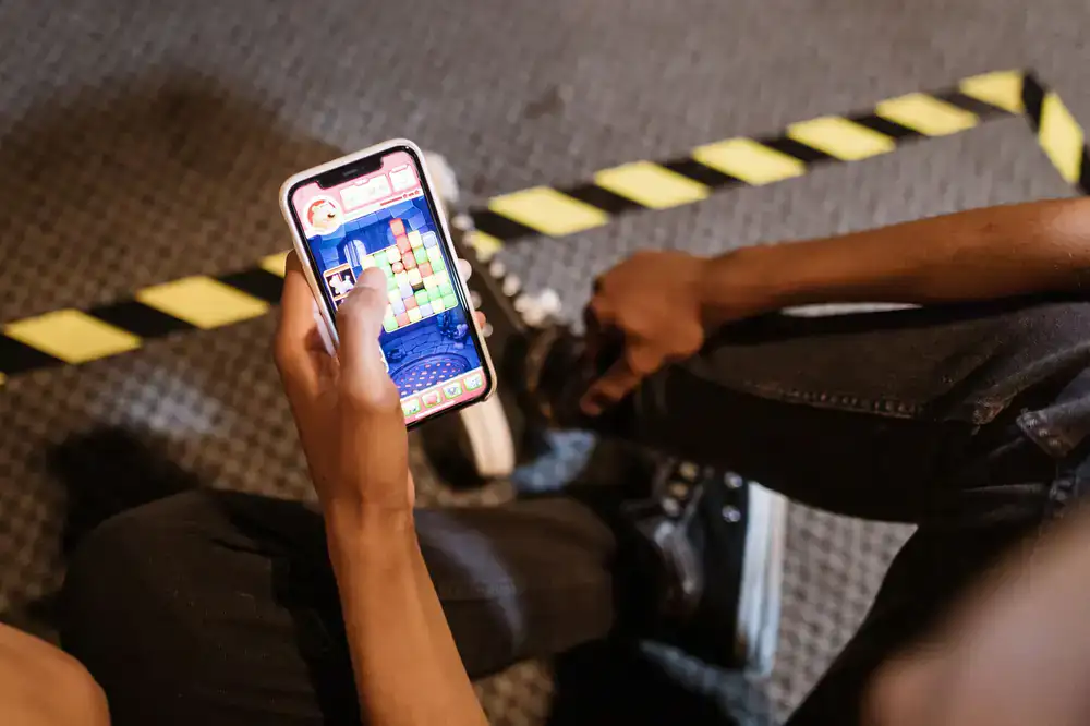 A player checking settings on a mobile puzzle game